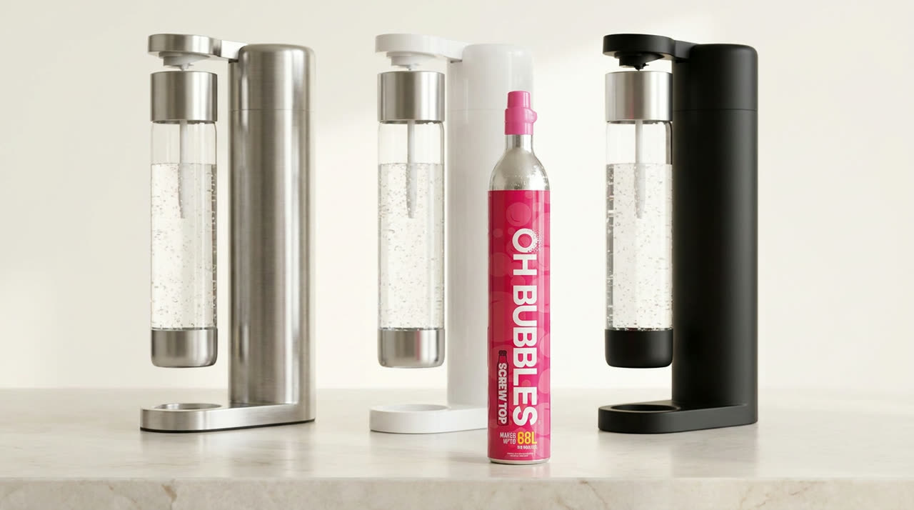 One pink OH Bubbles CO2 cylinder beside steel, white and black soda makers, fitting any standard machine