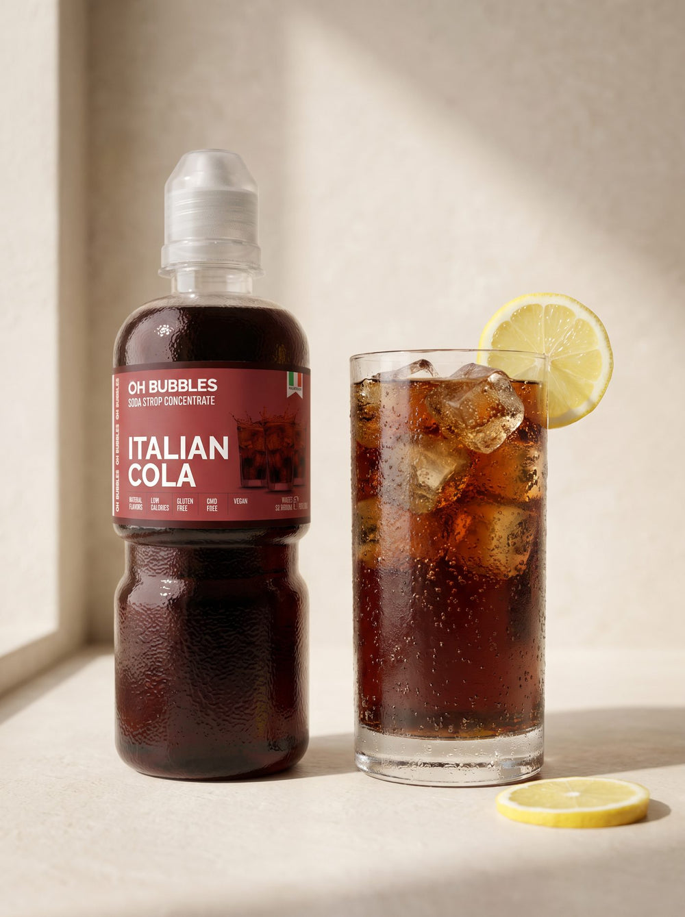 A finished Cola Concentrated Syrup drink over ice, made with real fruit