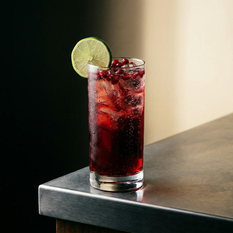 Pomegranate cooler with lime and seeds
