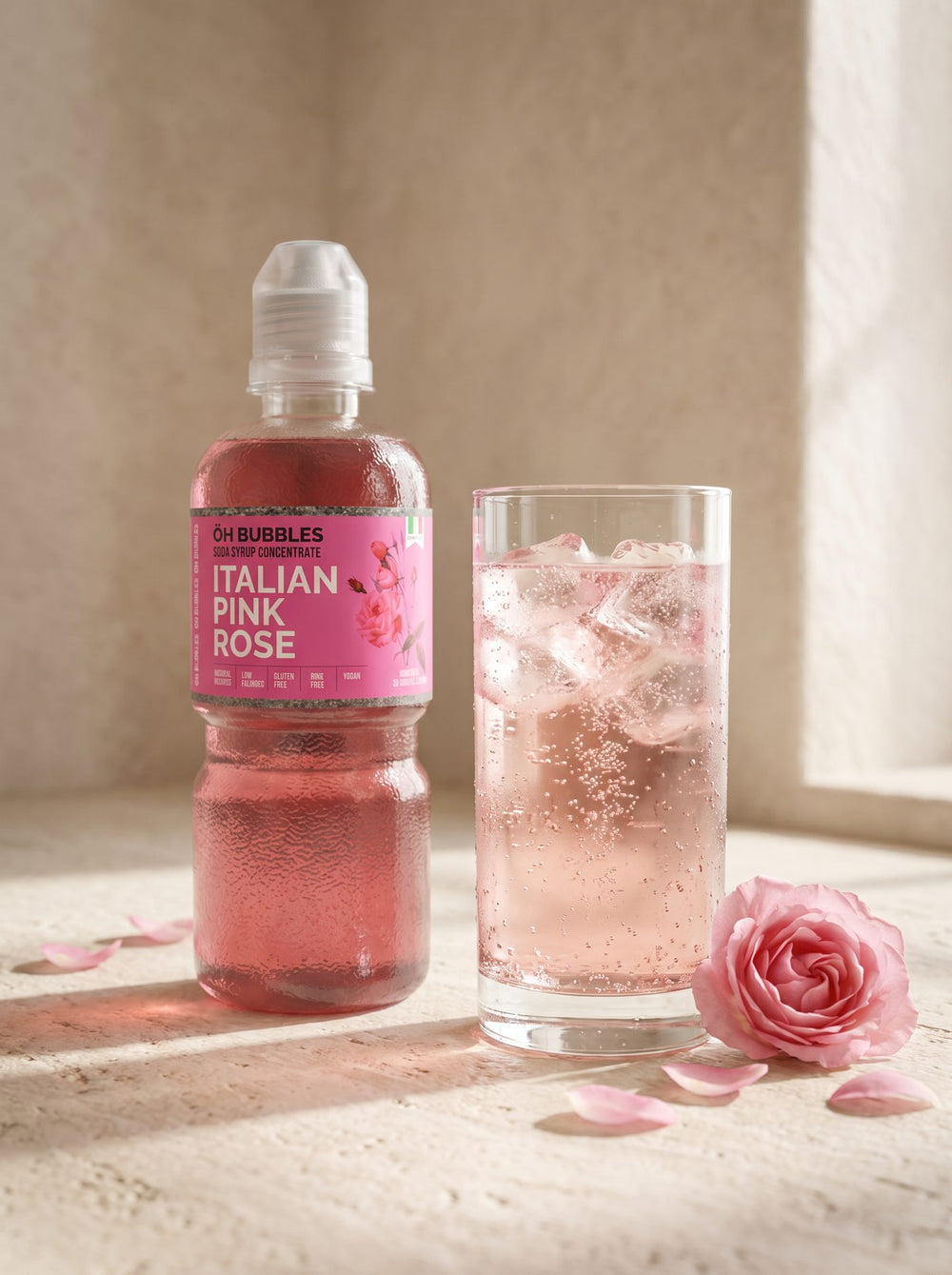 A finished Pink Rose Concentrated Syrup drink over ice, made with real fruit